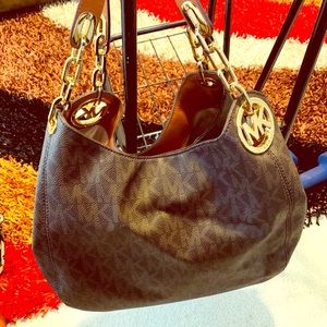 Michael kors Hand bag, Dooney and Burke hand bag,